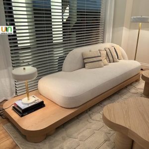 مبل مینیمال مدرن لوکس با طراحی منحنی و پایه چوبی روشن